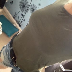 Green cropped t shirt .